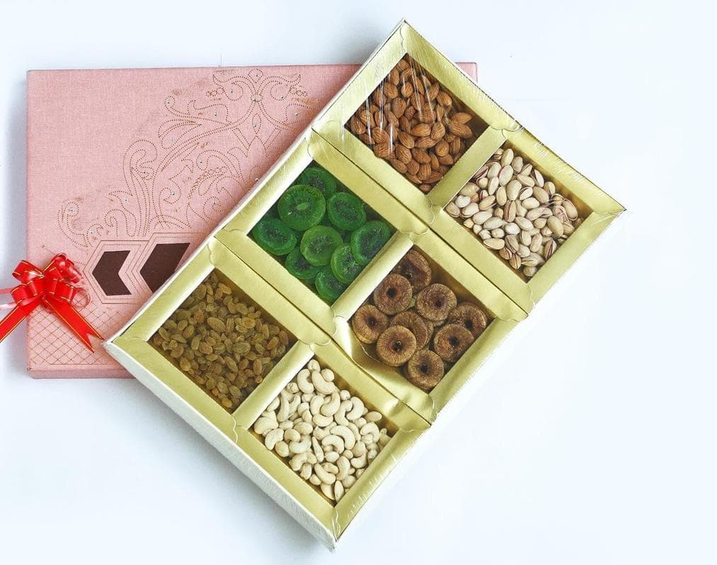 A premium Parampoorn gift box with a selection of assorted foods